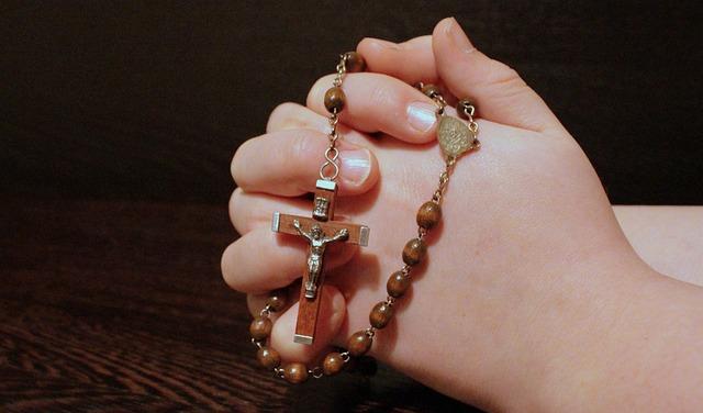 Adding Intricate Details: Drawing the Rosary Centerpiece